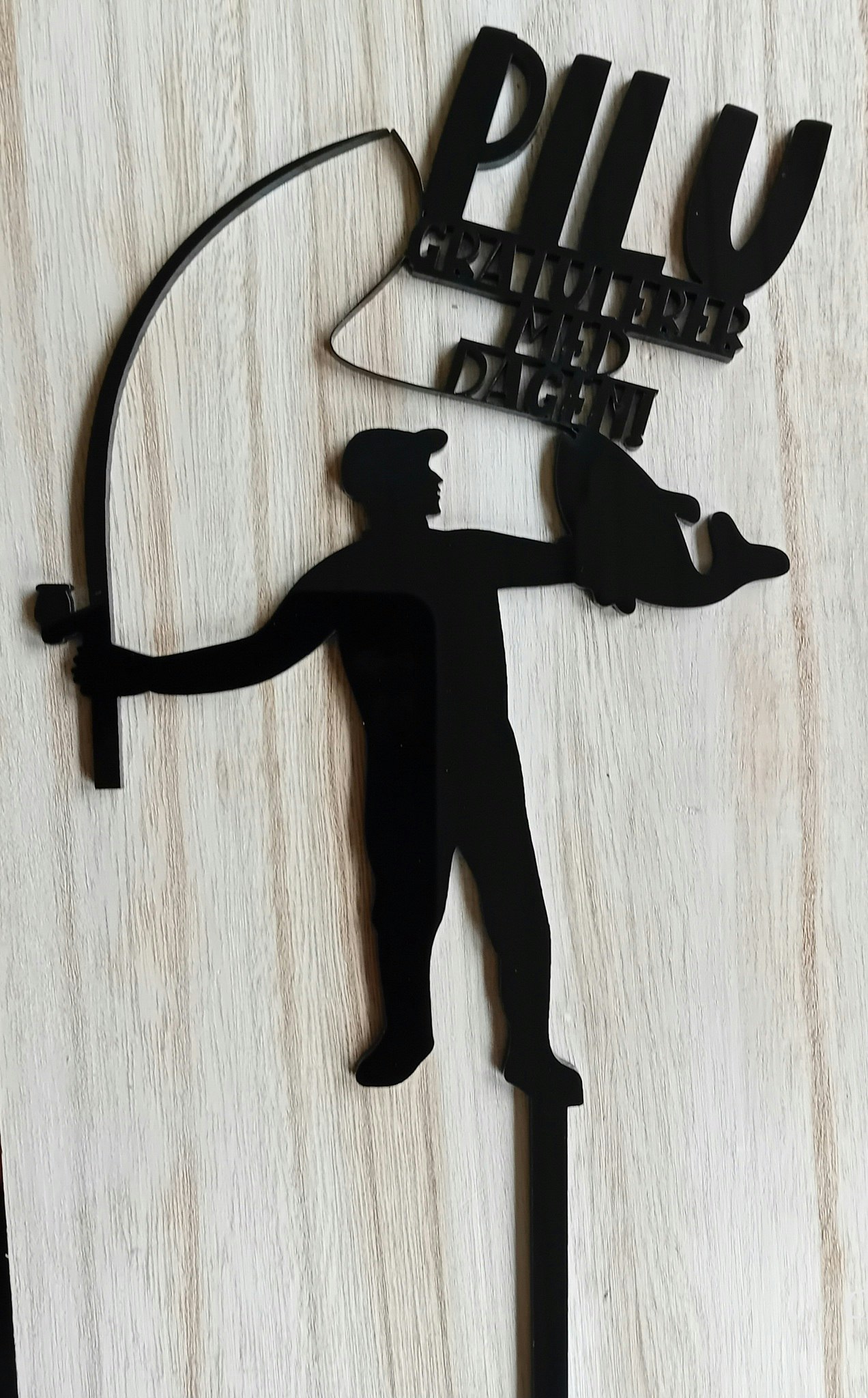 Kaketopp med figur og navn