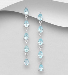 Silverörhängen vackra hängande med fem ljusblå opaler
