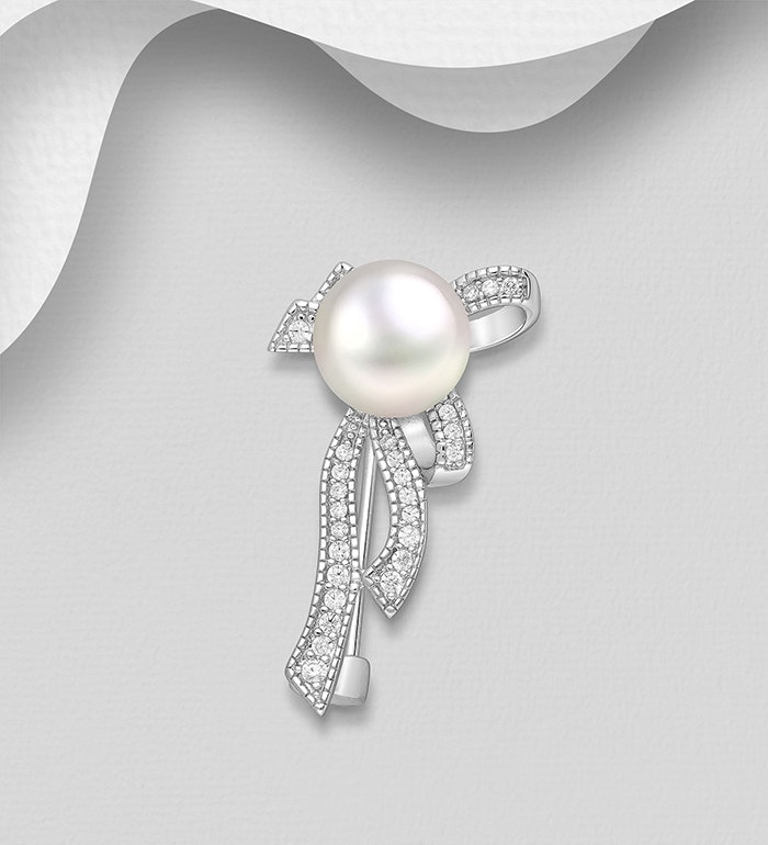 Silverbrosch vacker design med pärla &  Cubic Zirkonia