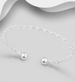 Flätat armband i cuff design - stelt silverarmband dam