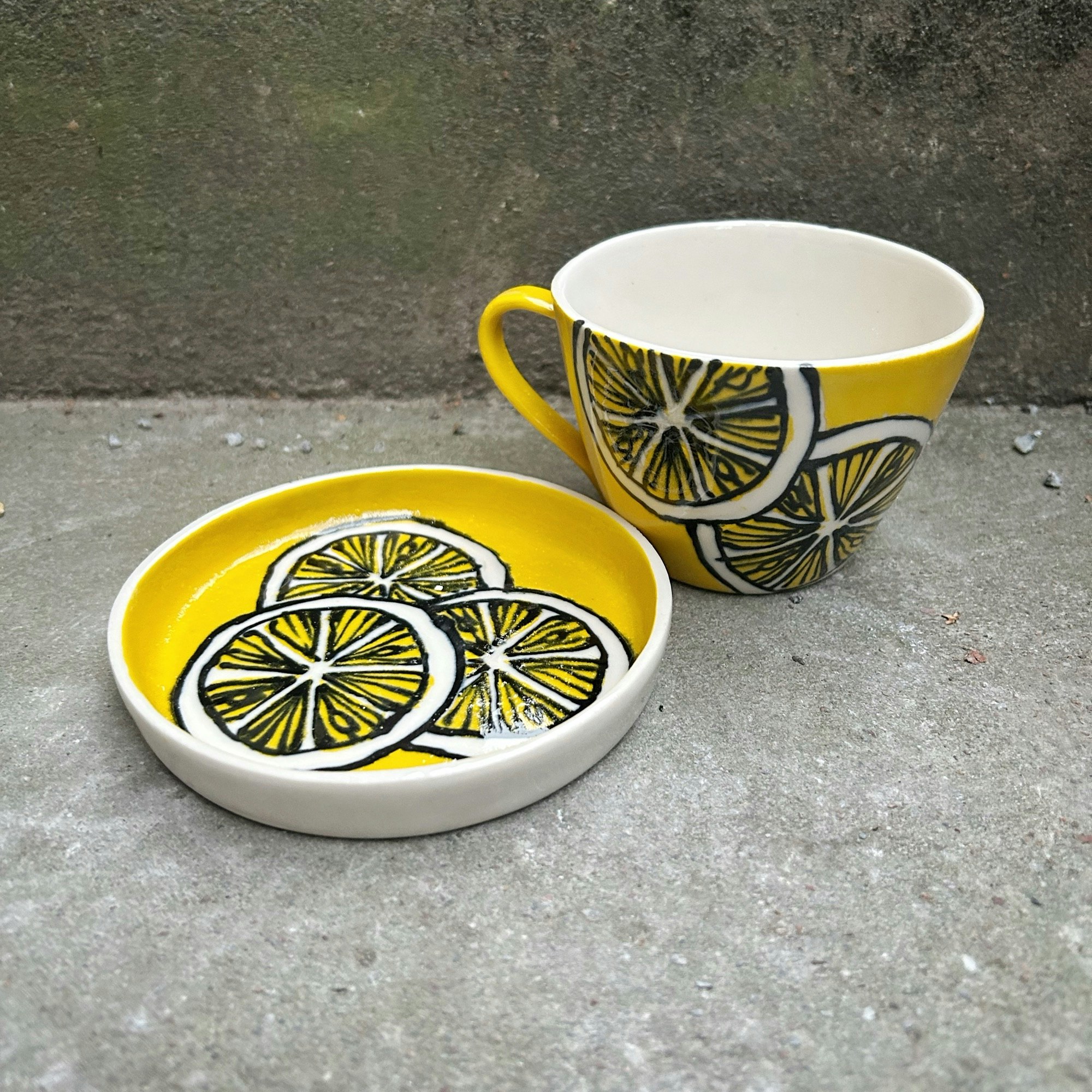 Kopp med fat gul citrus