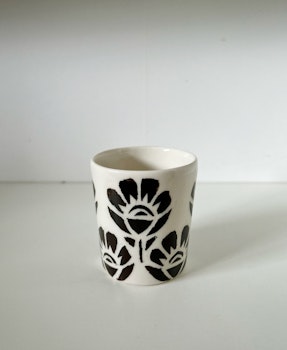 Liten kopp brun blomma