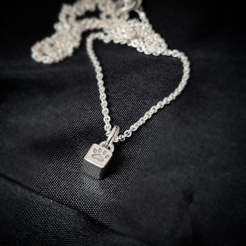 Lovepaws Tiny Paw - minihänge i silver