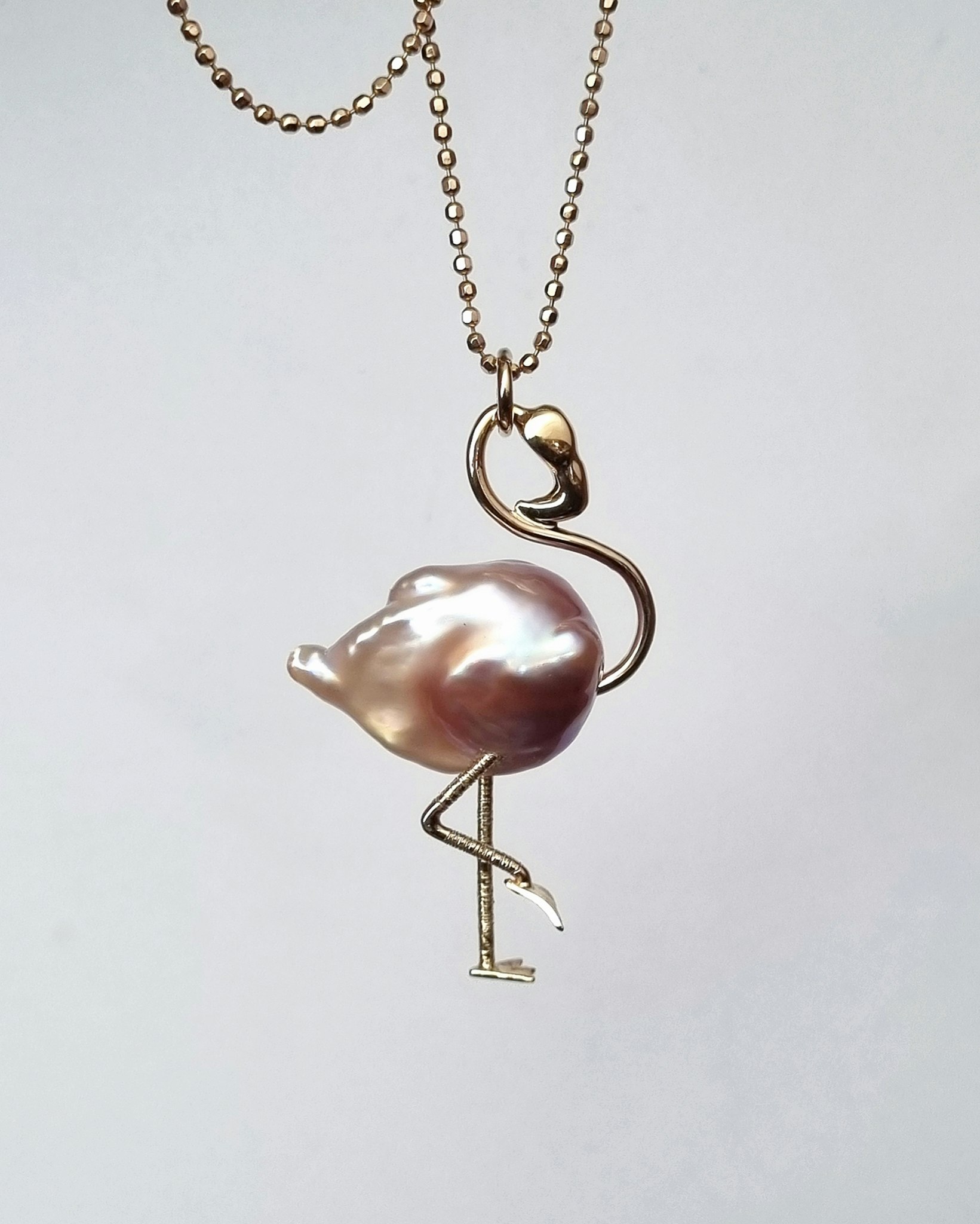 Flamingon Gertrud - pärlhänge i 18K guld