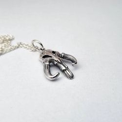 Mythosaur inspired scull silver pendant