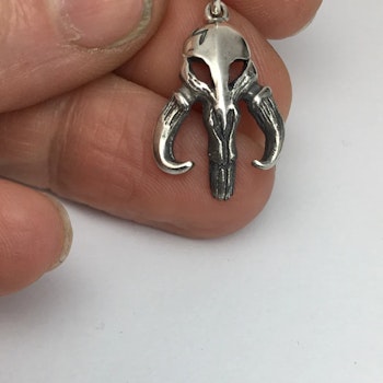 Mythosaur inspired scull silver pendant