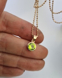 Fair Trade Peridot Mesa Verde - hänge i 18K guld