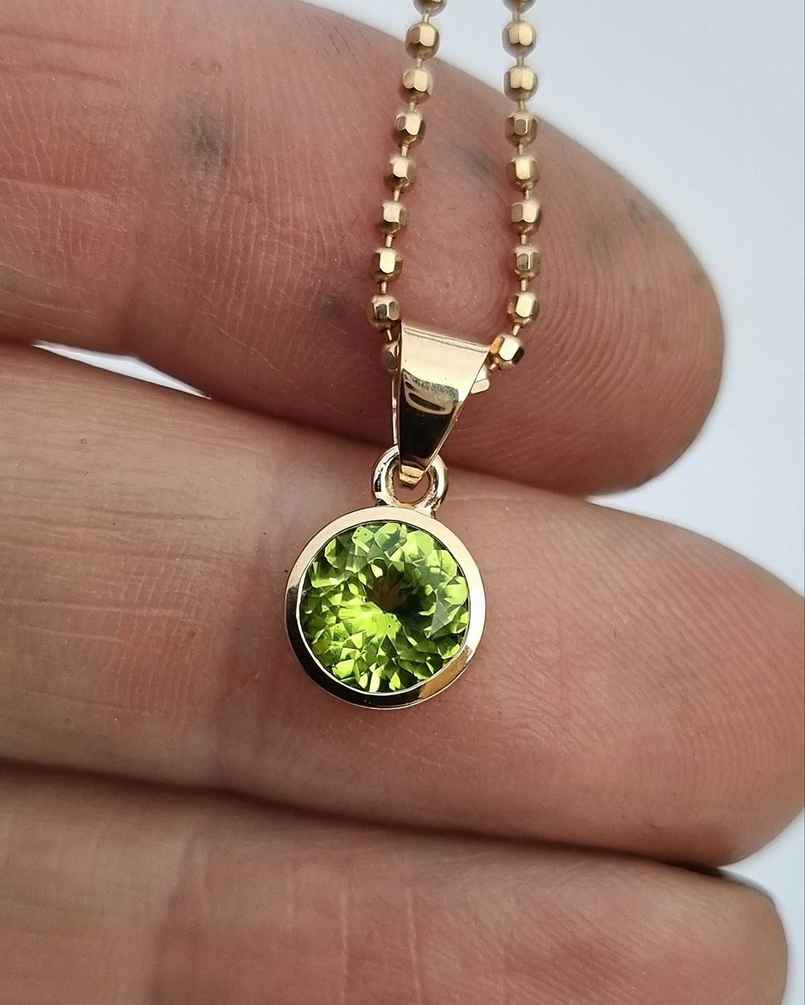 Fair Trade Peridot Mesa Verde - hänge i 18K guld