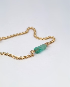 Armband i 18K guld med Råsmaragd