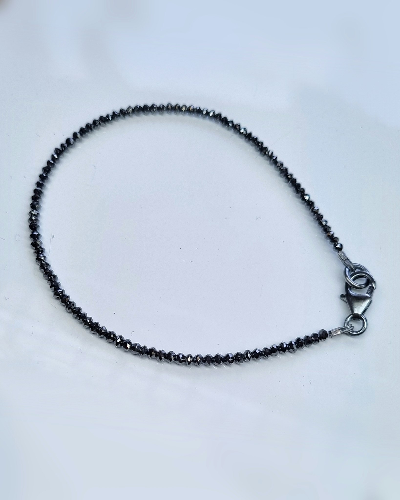 Gnistrigt svart Diamantarmband - till 20 cm