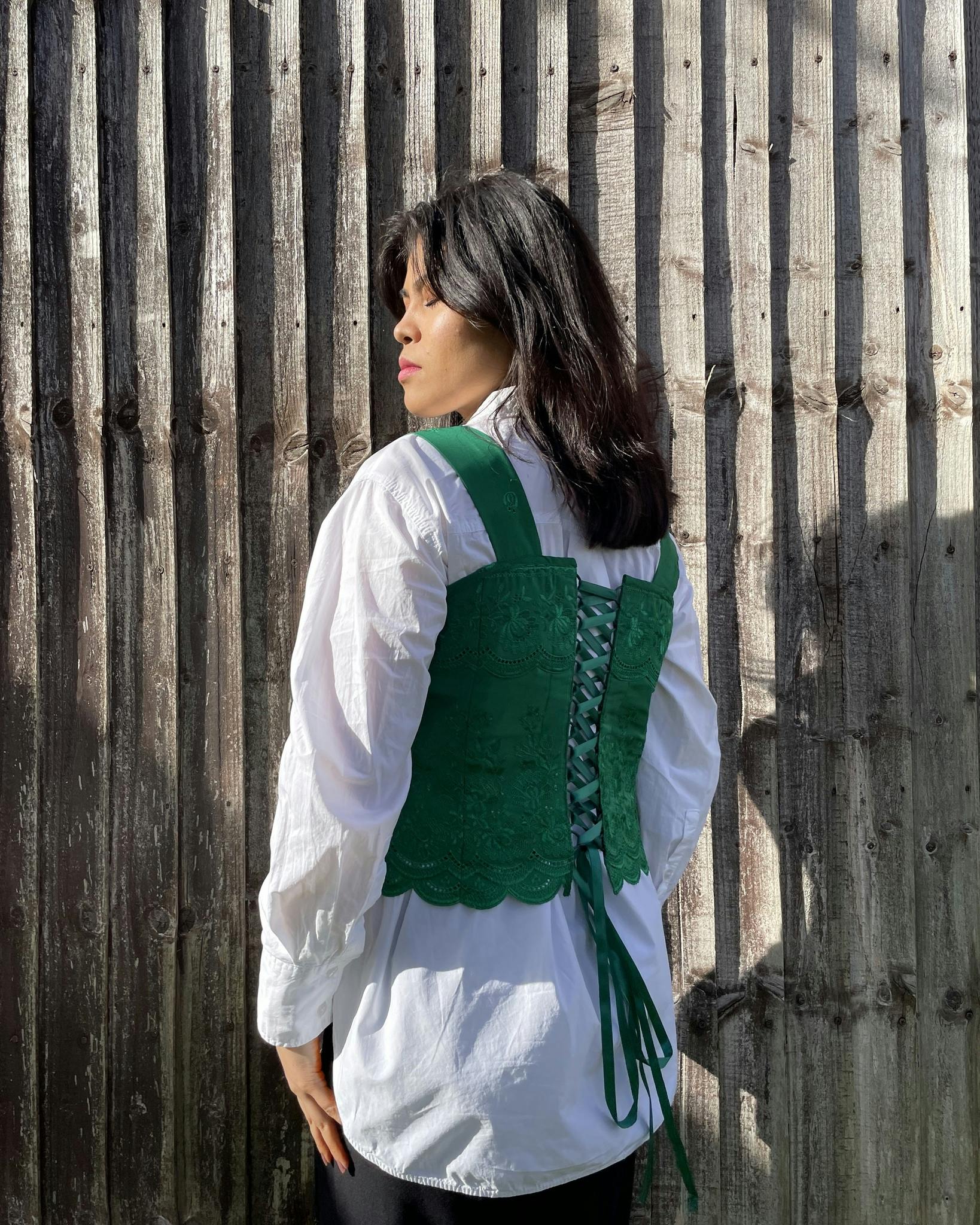 The handmade Nargis corset top features gorgeous traditional embroidered fabric with fully lined cotton fabric and an adjustable lace-up back where the name Nargis is inspired by the spring flower.