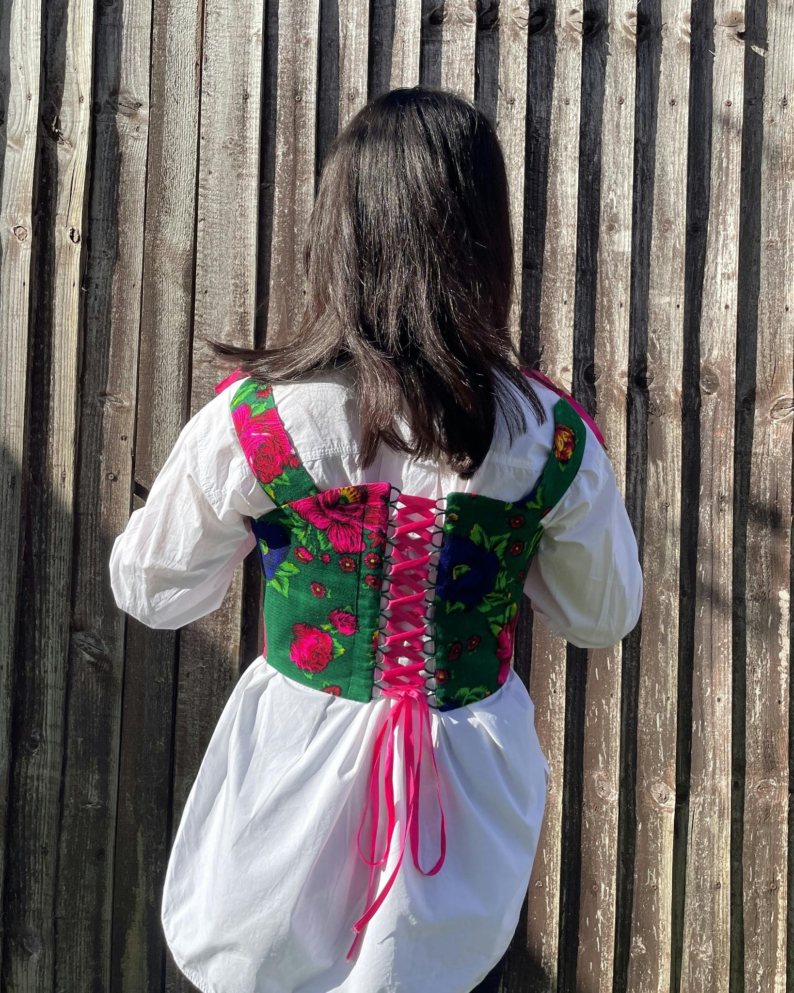 Handmade Benafshe corset top featuring gorgeous traditional Gulnigar fabric with fully lined cotton with an adjustable lace-up back. The name Benafshe is inspired by the spring flower.