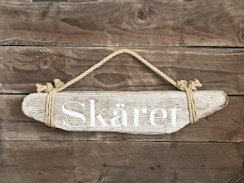 Skäret - skylt av drivved