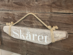 Skäret - skylt av drivved