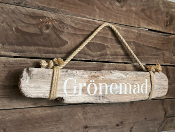 Grönemad - skylt av drivved