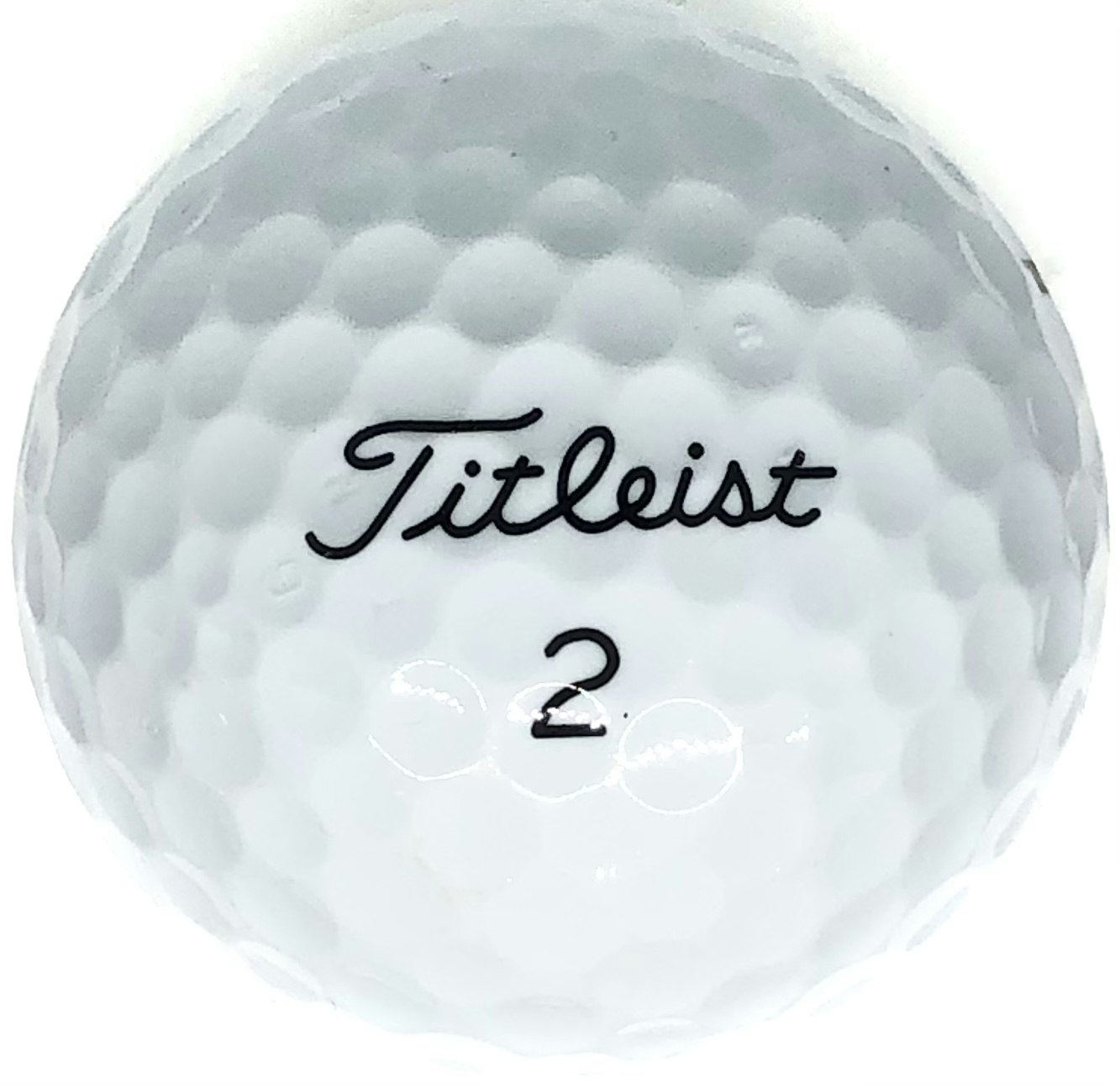 Detta är en vit golfboll, Titleist Mix