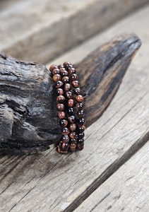 Oxöga, armband 6mm runda pärlor