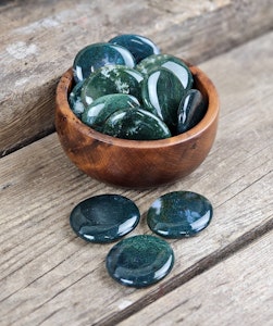 Mossagat platta, touchstone