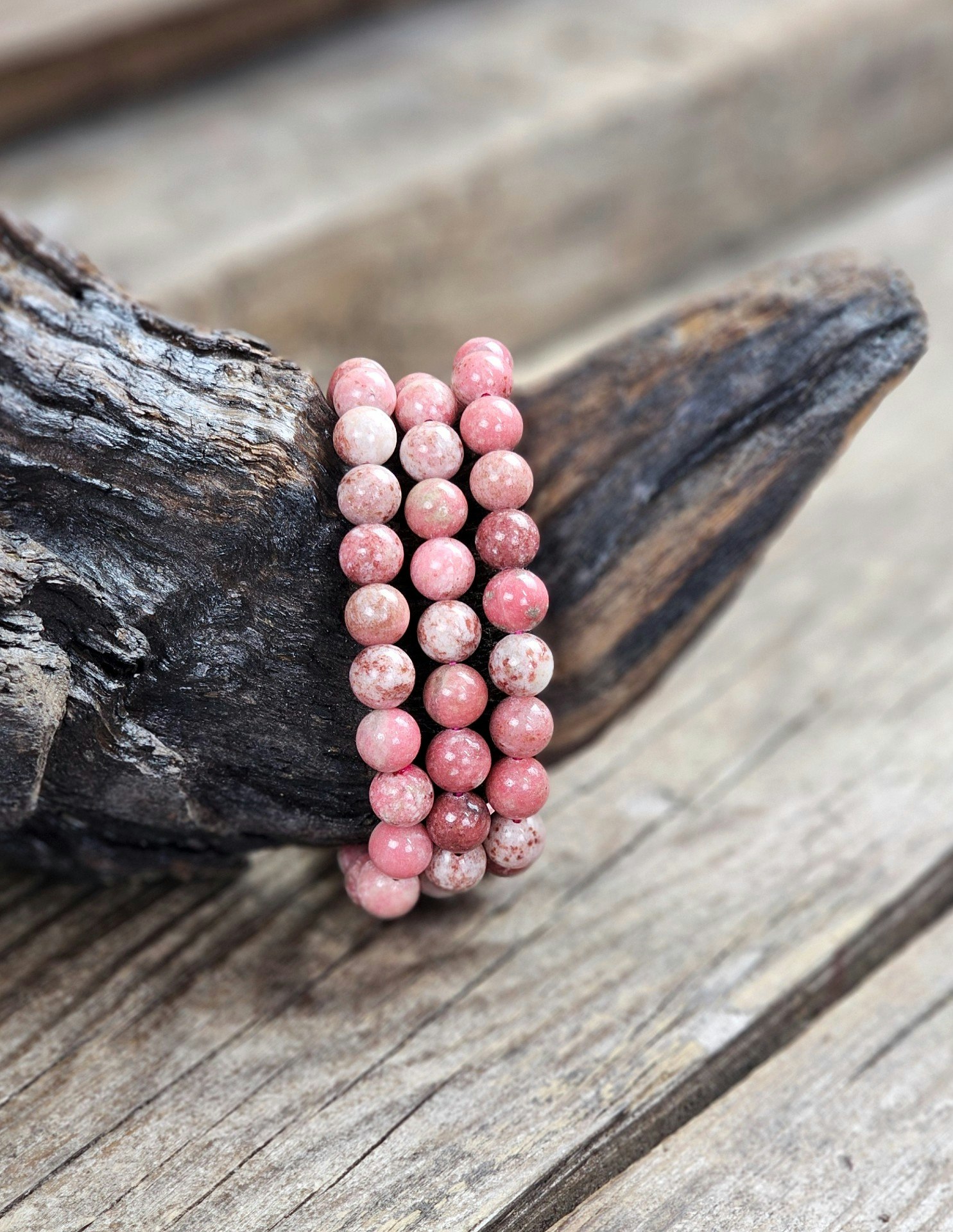 Thulit, armband 8mm runda pärlor