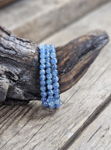 Kyanit extra klar, armband 6mm runda pärlor