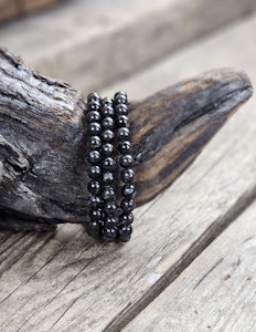 Astrofyllit, armband 6mm runda pärlor