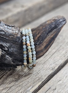 Blå/Brun Onyx, armband 5-6mm runda pärlor