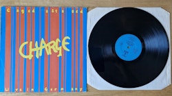 Charged, Caged & Staged. Vinyl LP