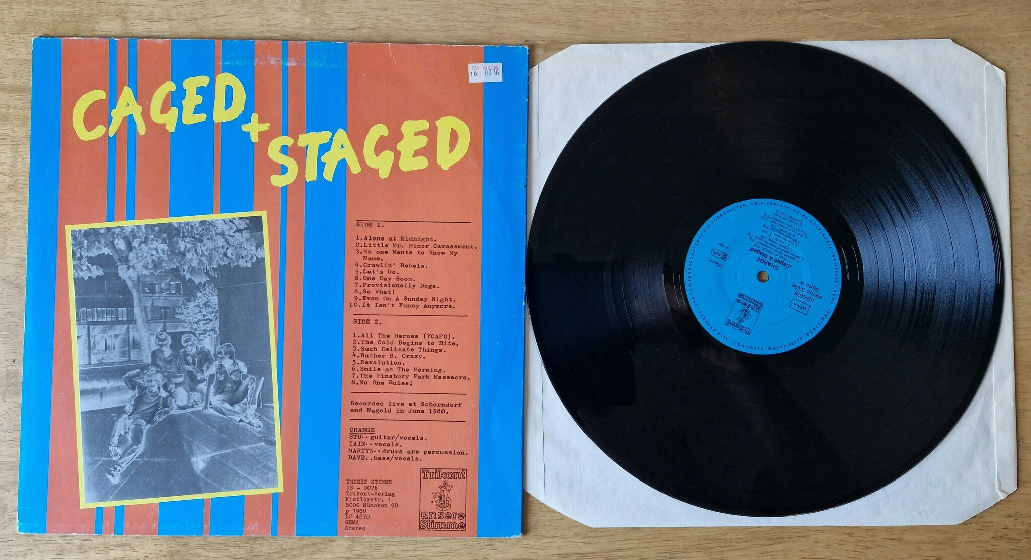 Charged, Caged & Staged. Vinyl LP