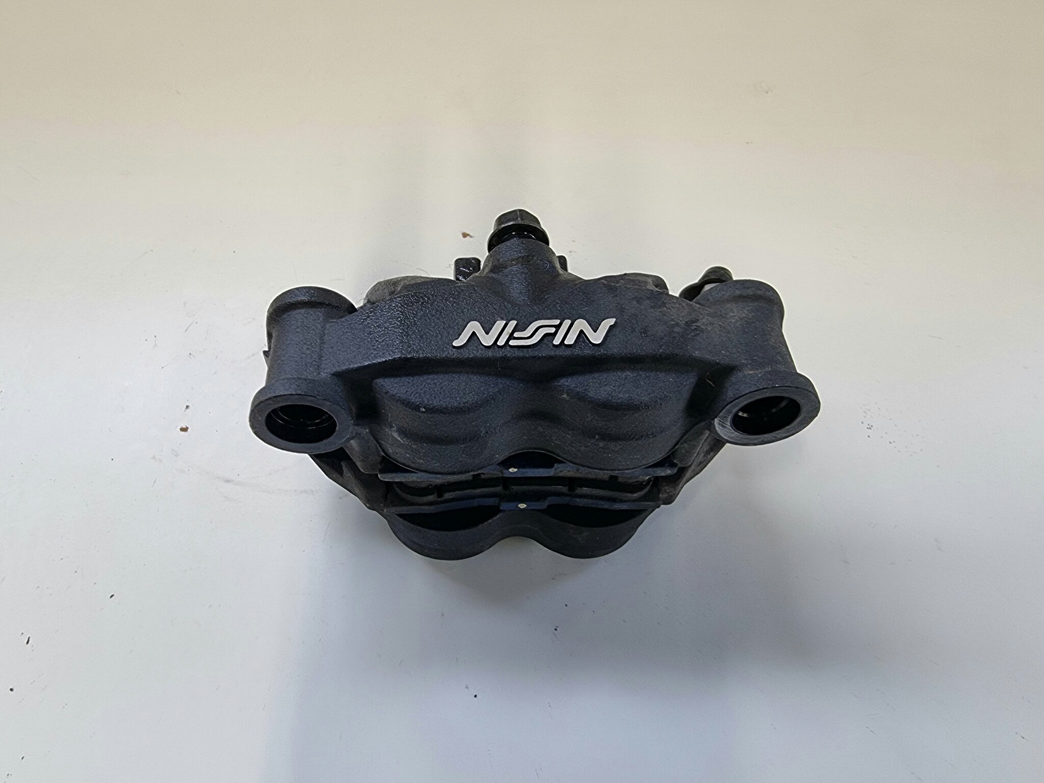 Honda CB125R Bremsecaliper Foran / Brake Caliper Front
