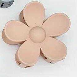 Hårklämma blomma