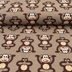 Glada apor på brunt