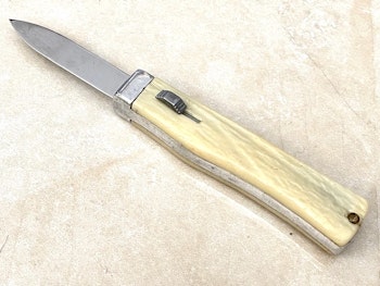 Vintage B&S Automatic knife with button opener