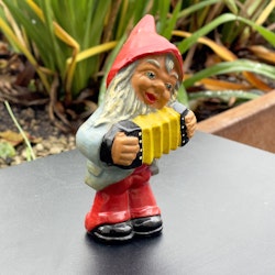 Äldre dragspelande tomte