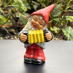 Äldre dragspelande tomte