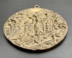Medalla de Zosia alimentando aves de corral 1885