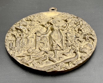 Medal of Zosia feeding poultry 1885