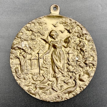 Medal of Zosia feeding poultry 1885