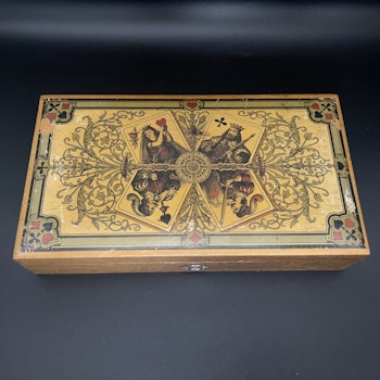 Antique playing card set and chips in wooden box