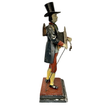 Figure clock of a Black Forest clock bearer, painted by hand