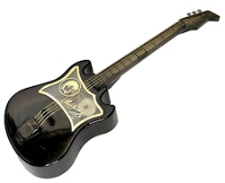 Il carillon a forma di chitarra di Elvis - gira e suona la canzone Love Me Tender