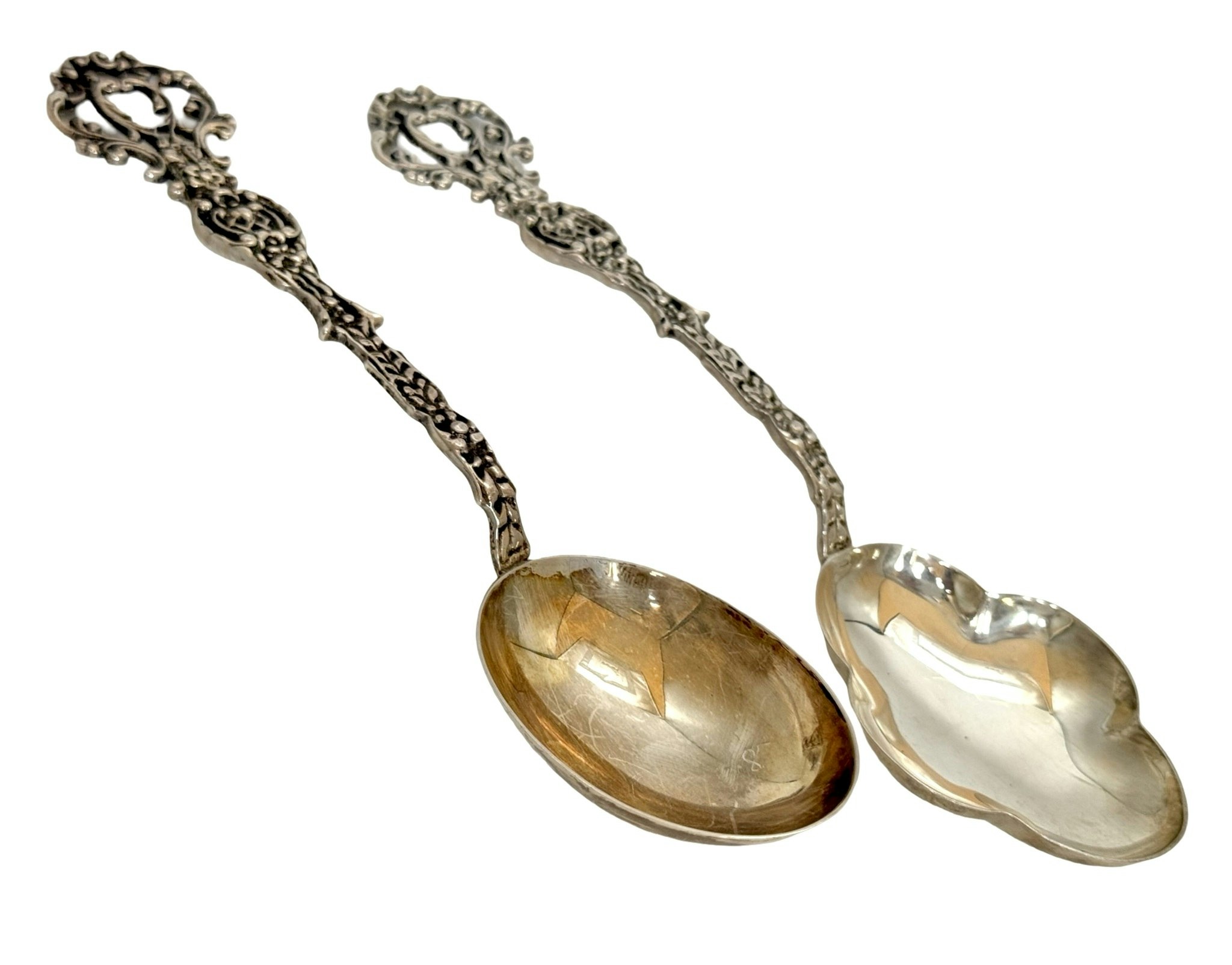 GEWE skedar i silver, dekor rosor, 1957