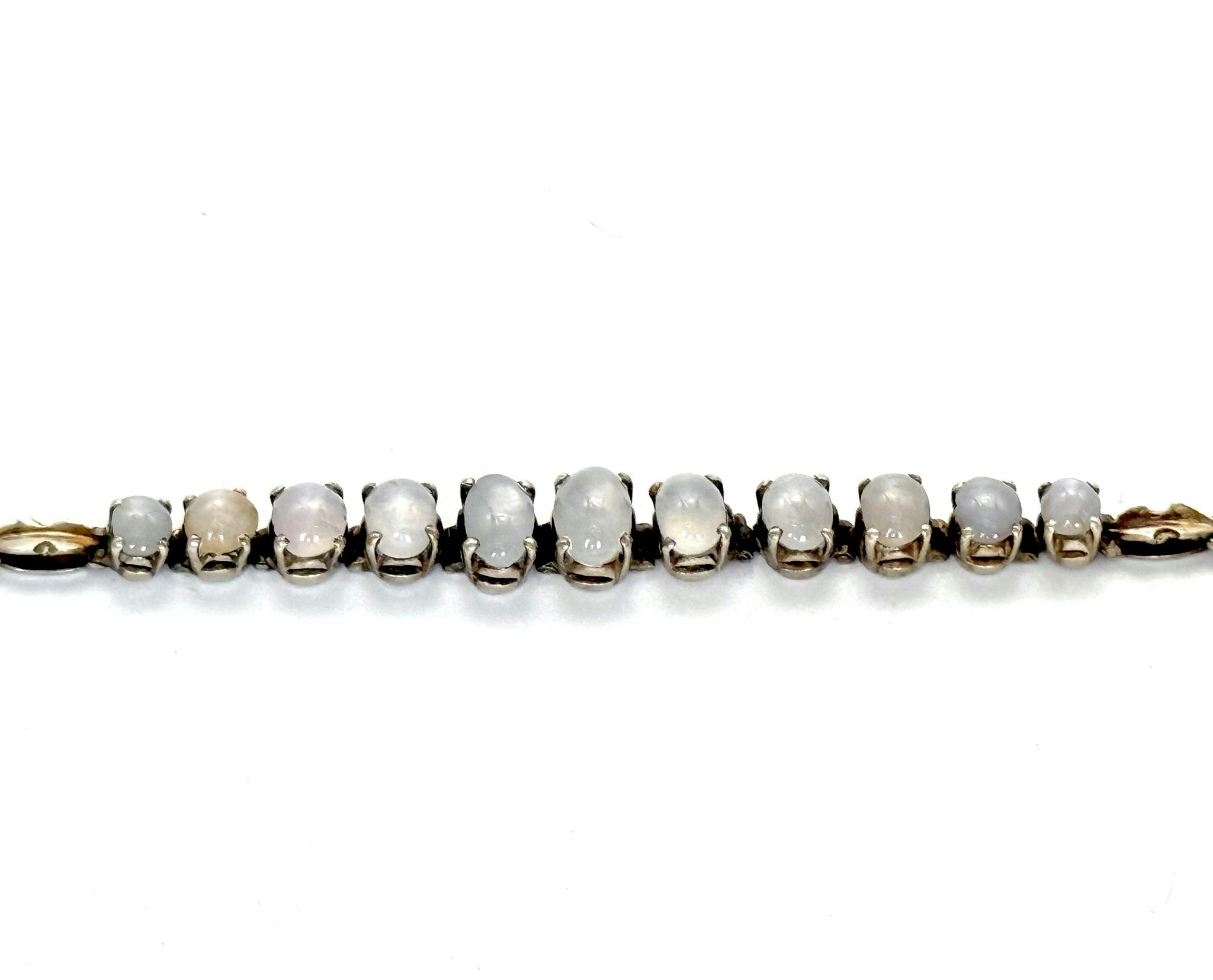 ARMBAND mittdekor av 11 stjärnsafirer