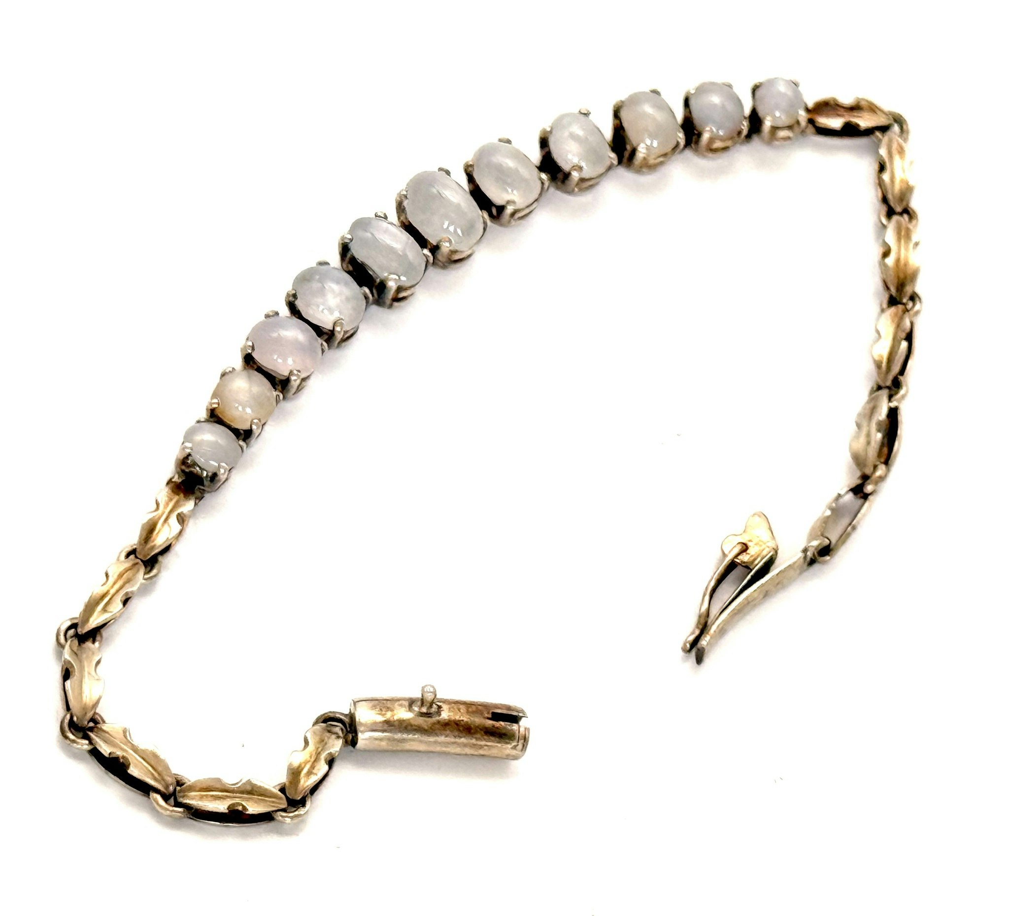 ARMBAND mittdekor av 11 stjärnsafirer