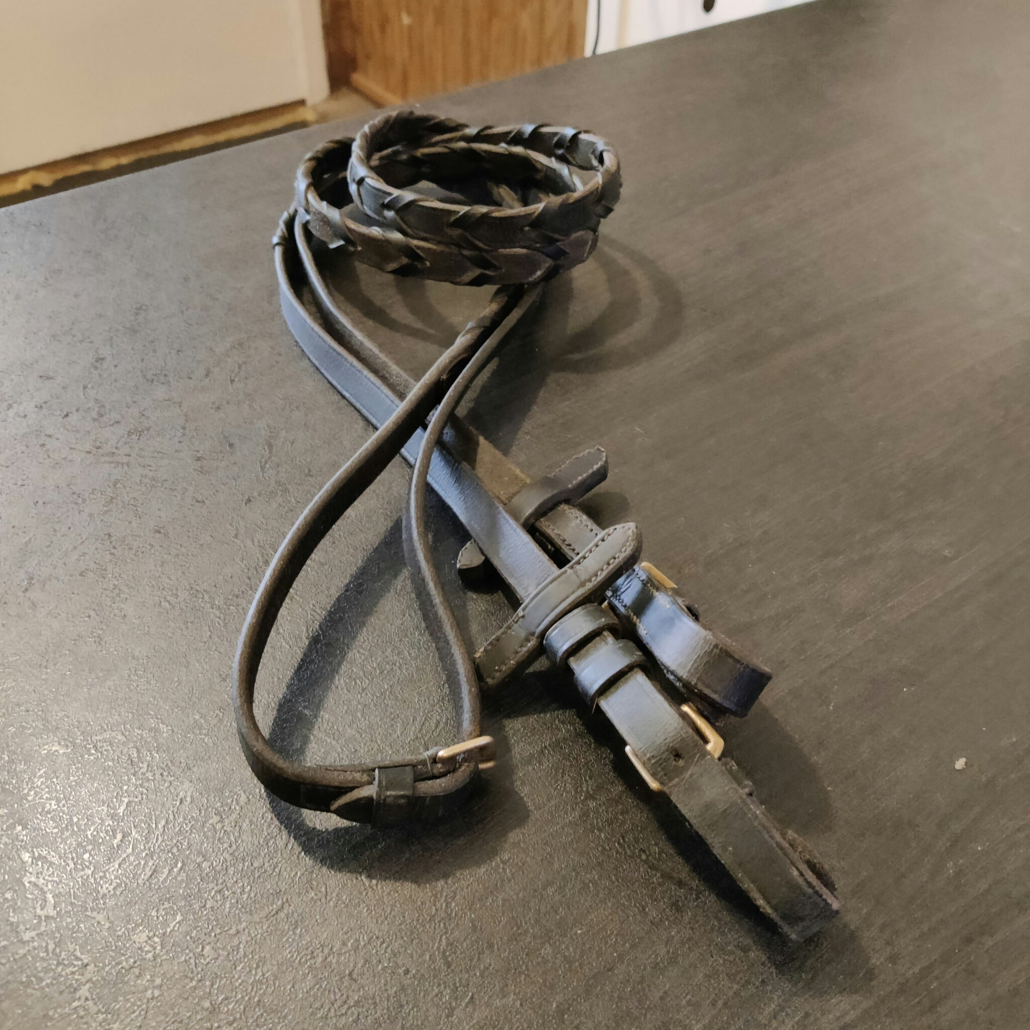 Svarta kantflätade tyglar FULL