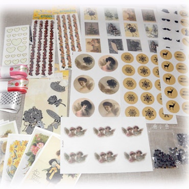 ca 20 paket dekorationer + stickers + toppers