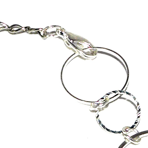 Armband - stilren med runda ringar och filigranpärla
