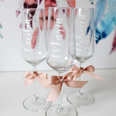 Champagneglas med text