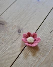 Blomma