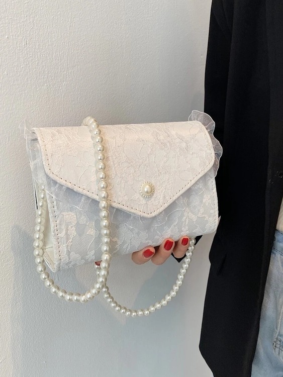 Iriseva Vit med pärlor handväska