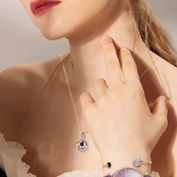 Iriseva klocka med armband, halsband och örhängen